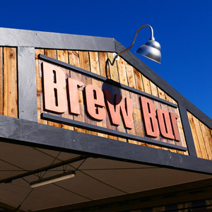 Brew Bar at Glastonbury, a Bespoke Bar Design with Wooden Facia